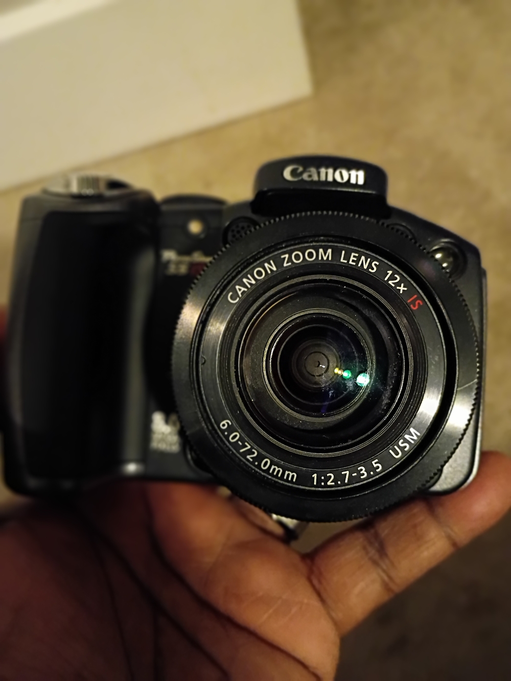 Canon Black Digital Camera with 12x Zoom Lens With Carry Bag